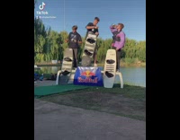 Wakeboard winner splashes drink over competitors 