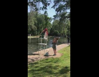 Girl little mermaid costume lifeguard seat park