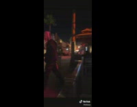 Clown chainsaw walks to girl after she is pointed at 