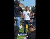 Man Wears Vaccine Card Around Neck 