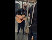 Collab Subway Creatures - Musician Sings with Guitar and Mic on Subway Ride