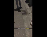 Guys look down storm drain explodes smoke 