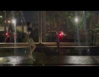 Man and woman dramatic pose water fountain park