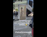 Guy in white clear box sand art