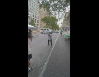 Old woman dances to groovy music 