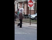 Brown jacket guy plastic bag head corona 