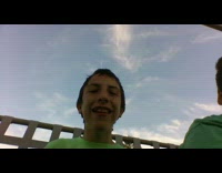 Guy lights plastic bag on fire backyard 