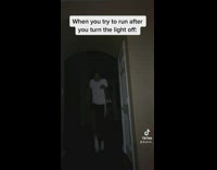 Guy runs after turning off living room light