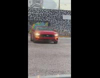 Man pictures red sports car part 2