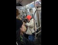 Man medieval knight armor ride subway train