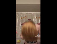 Woman copy tiktok hit head on sink