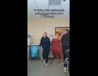 2 women dance with fake man filter 