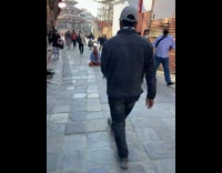 Guy films himself while he meditates on the street