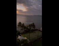 Collab BoysIG_Default - View of the beach from resort balcony