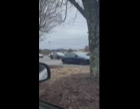 Man sees cyber trucks parked on parking lot 