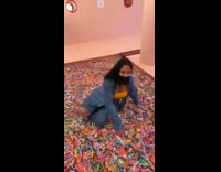 Girl jumps into fake pool of sprinkles 