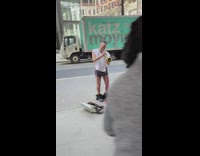 Guy plays trumpet with pants pulled down