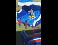 Blue Beanie Falls Off Yellow Surfboard Blue Wave Machine