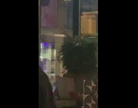 Person on Messy Hair Day Reads Menu