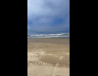 Man shows beach chair move around shore