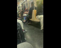 Woman balances water bottle on her head