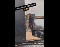 Amish guy dances outside car