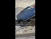 BitchMP - Blue jeep parked on rocks