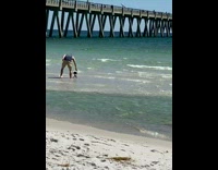 Man blue tank top timer run beach Part 2