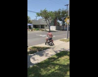 Guy jumps over kiddie pool on bike runs into car