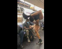 Guy does tricks on train ride 