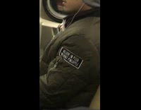 man green jacket black patch