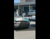 Woman lay on pool divider large pillow