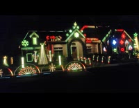 House yard full of dancing Christmas lights