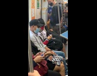 Blindfolded guy solves rubiks cube train backpack