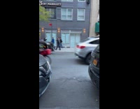 Acapella group shooting video on sidewalk