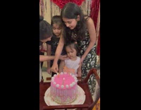 Birthday girl not happy when cake is cut