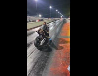 Man flies out from motorcycle on race track