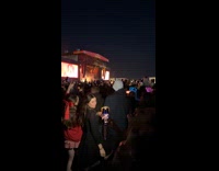 Woman filmed at concert crowd with lights