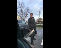 People argue over parking spot red jacket 