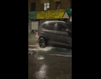 Street floods at intersection 