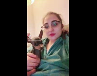 Collab BitchMP - Girl in green jacket horse face filter scares dog 