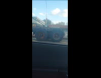 Guy control RC motorcycle do wheelie road