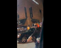 Two women twerks on the car roof