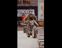 Fashionable Man Recovers Balance on Brakeless Bike