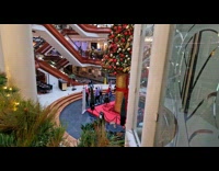 Group dances middle of Christmas themed mall