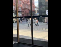 Four women group dance side of street