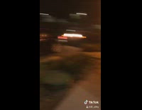 Girl white car holding up drive thru