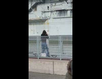 IITW - Man with helmet in front of ship 