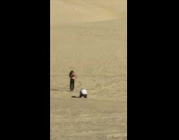 Black crop top pants girl sand desert 