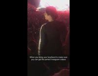 Girl dances in middle of seating area 